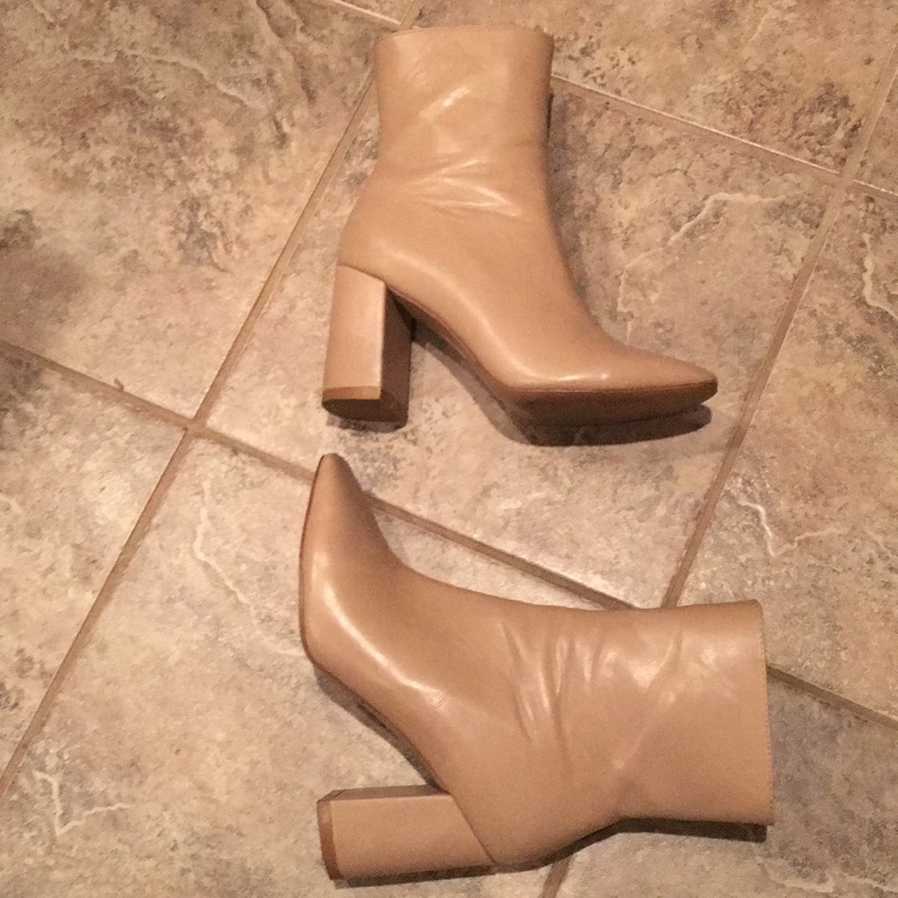 Tan high heeled booties